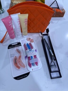 Makeup case, eyebrow & lash tools & cake creams